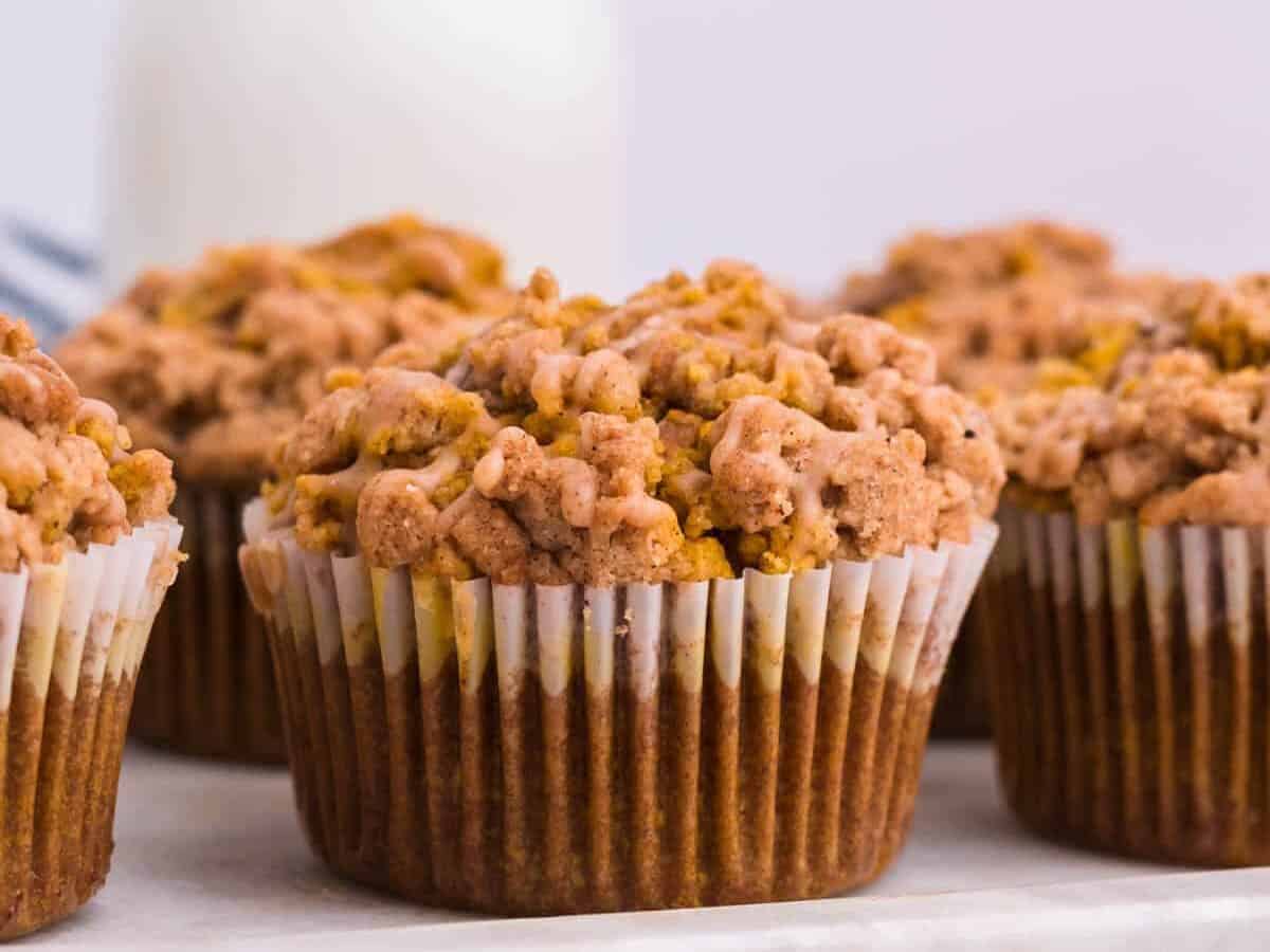 Pumpkin muffins with tall topping.