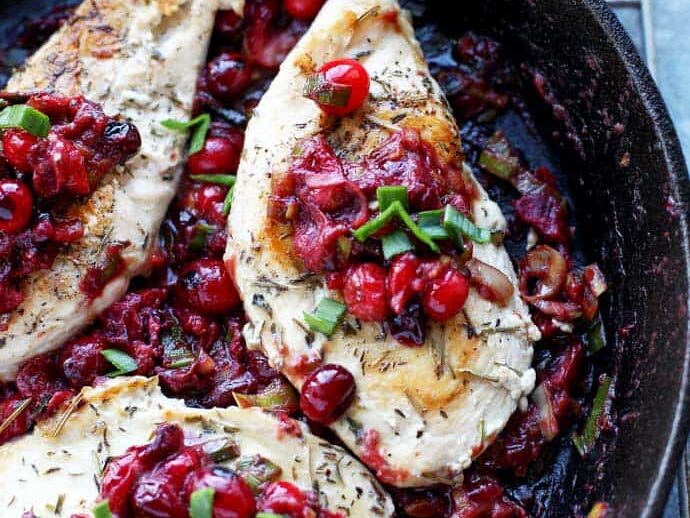 Skillet Cranberry and Leek Chicken in a cast iron skillet.