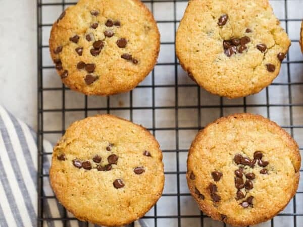 Gluten Free Banana Chocolate Chip Muffins on a cooling rack.