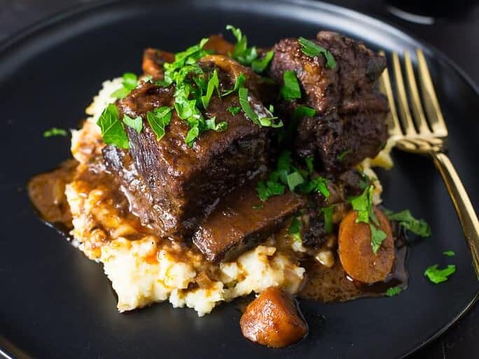Red Wine Braised Short Ribs with cilantro.