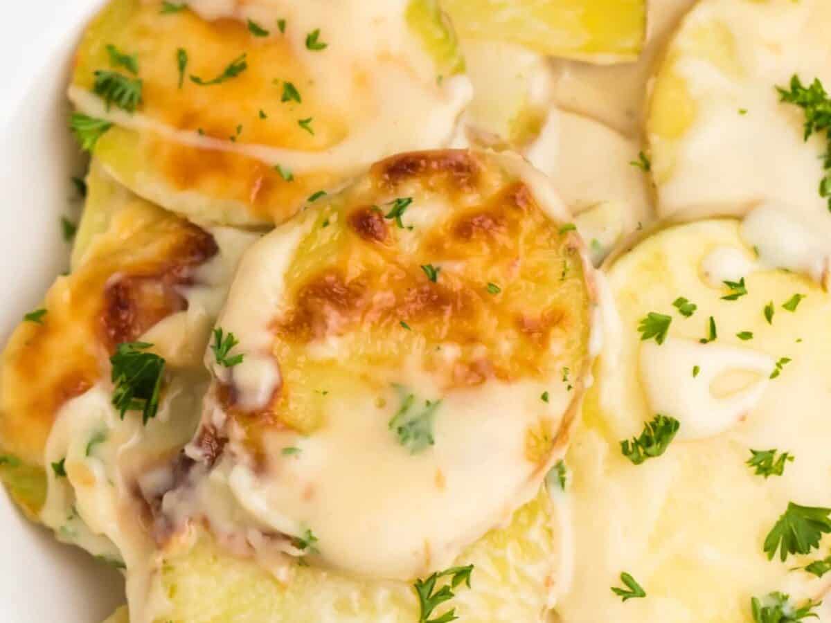 Air Fryer Scalloped Potatoes served on a white plate.