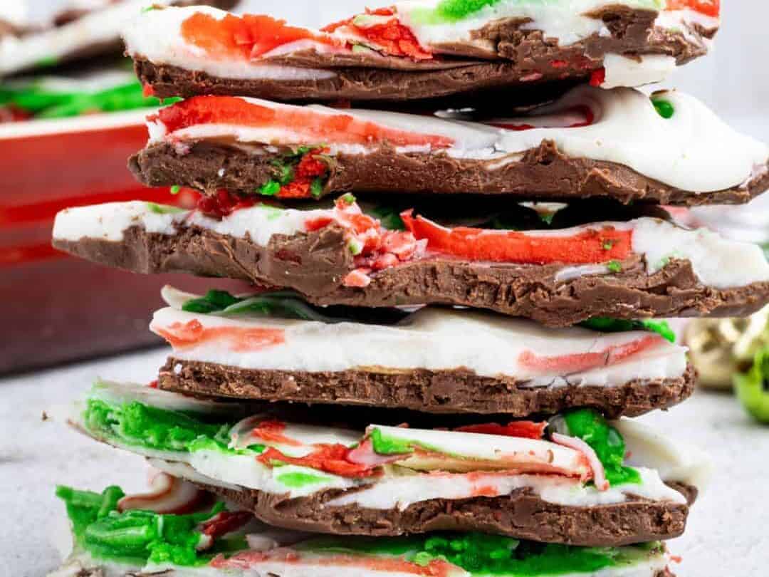 Chocolate candy cane bark stacked on top of each other.