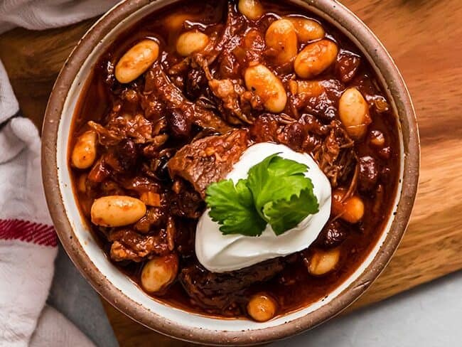 BEER BRAISED SHORT RIB CHILI in a bowl
