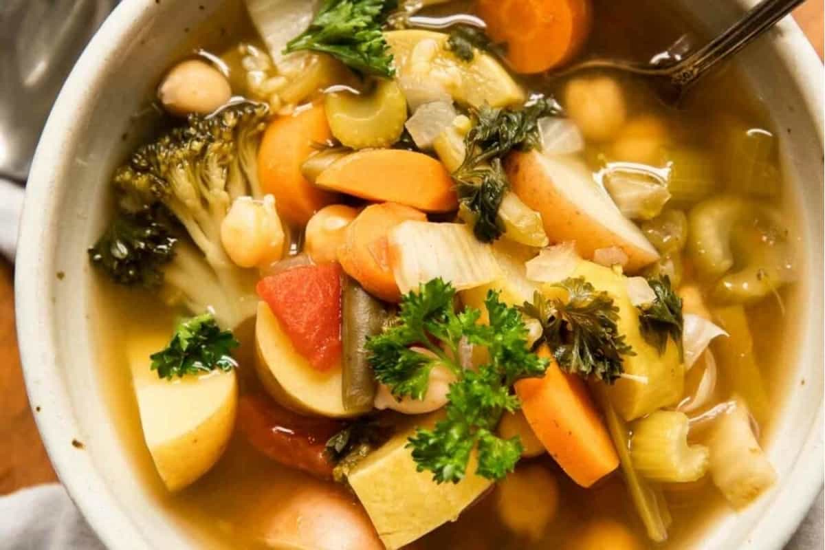 A bowl of crockpot vegetable soup. 