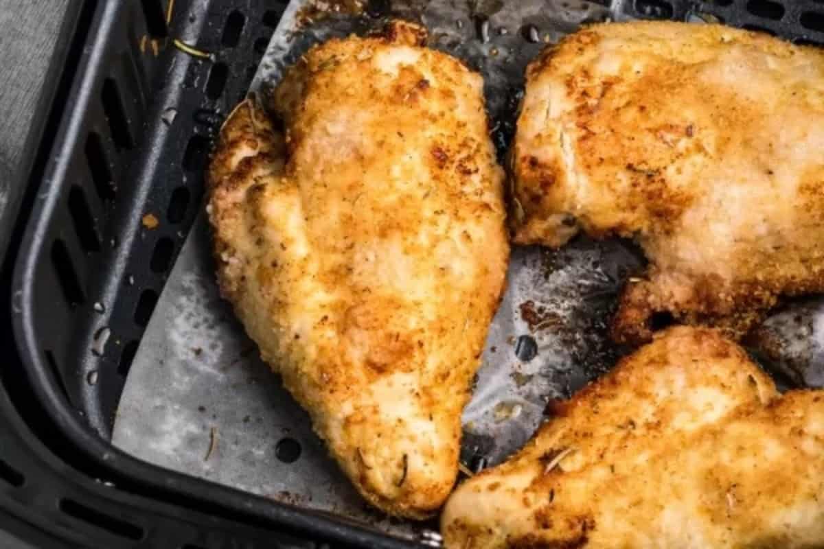 Chicken breasts in a pan.