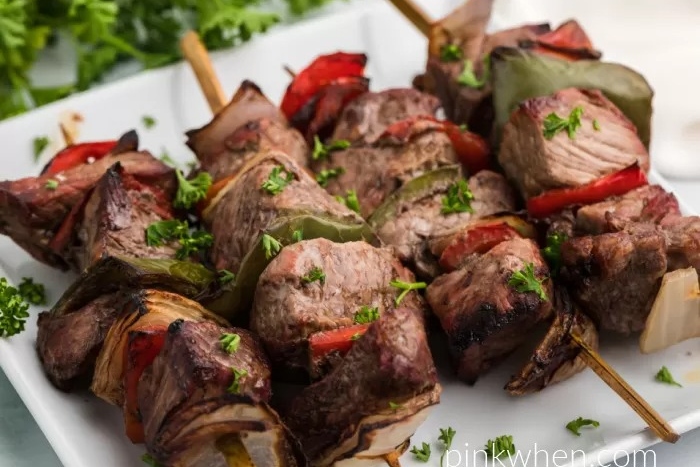 Kabobs on a plate.