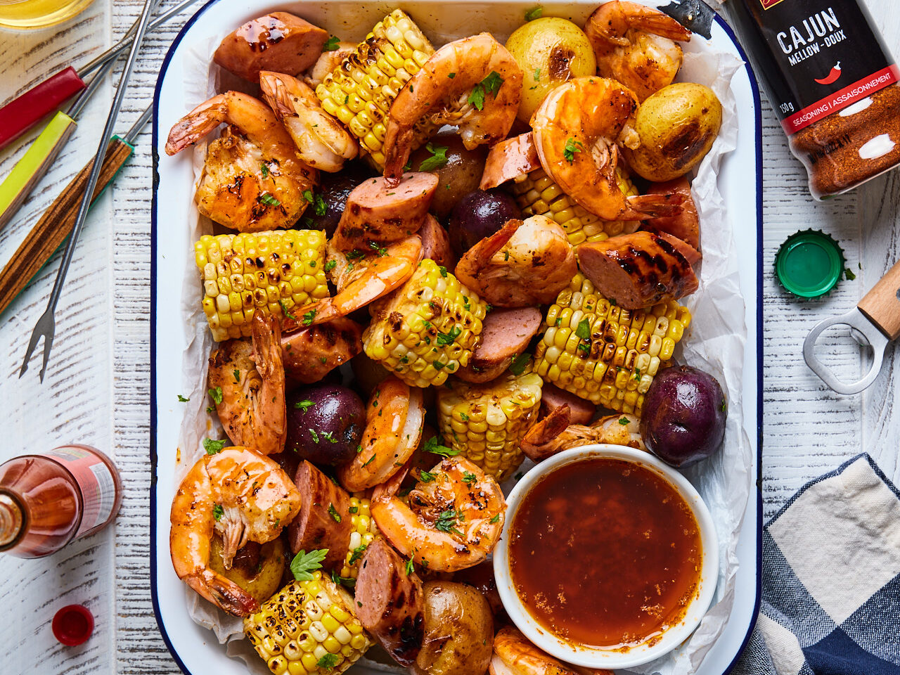 Shrimp and corn on a platter.