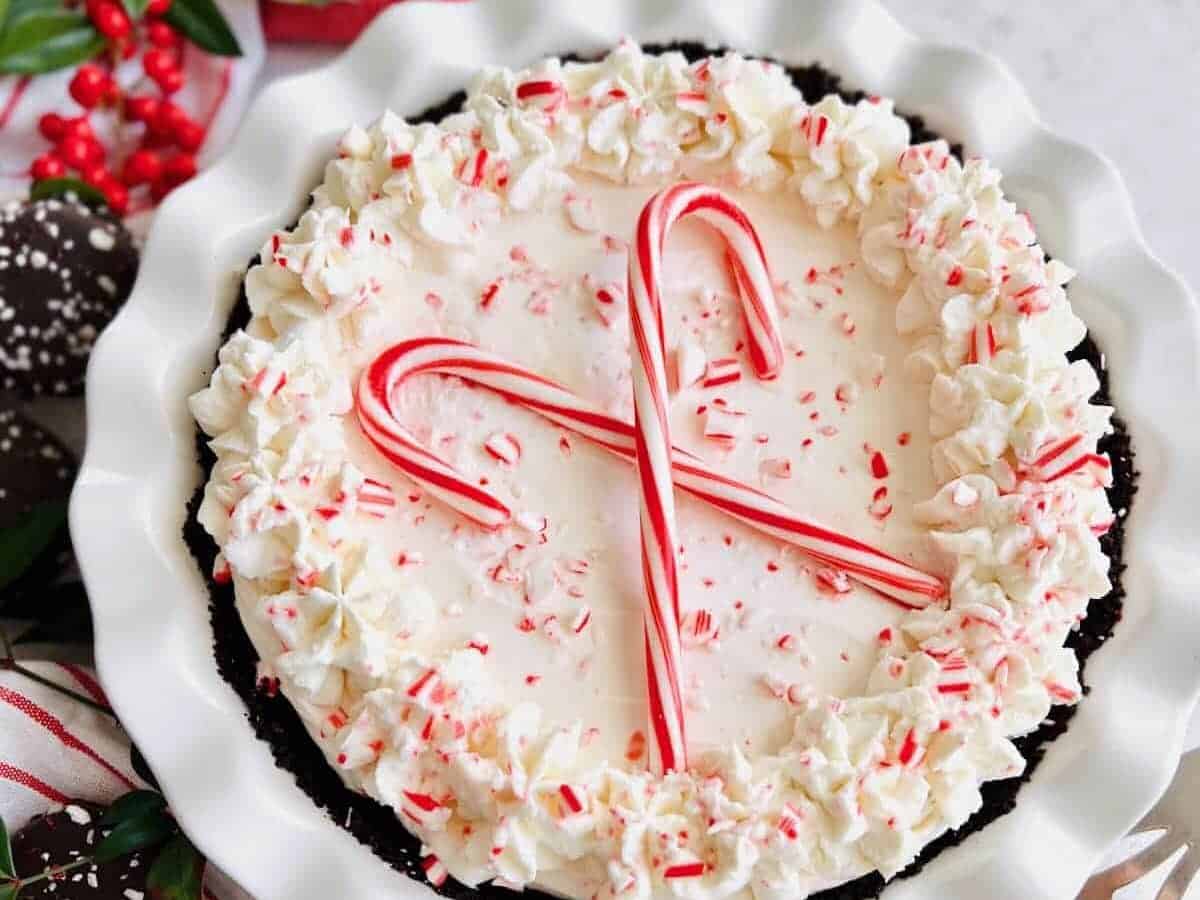 No bake candy cane pie on a round dish.