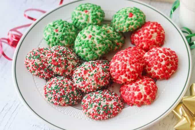 Christmas Sprinkle Cookies on a round plate. 