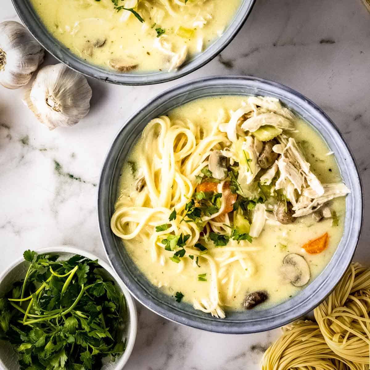 Creamy turkey soup with cilantro and noodles. 
