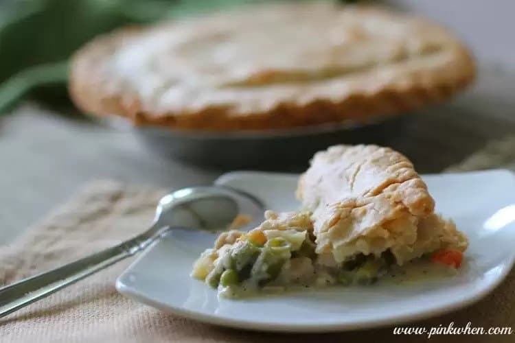 A slice of Delicious Turkey Pot Pie on a plate.