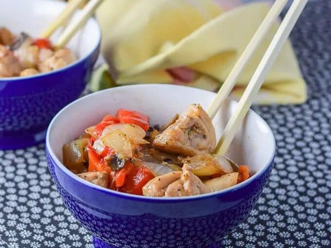 Chicken, peppers and onions stir fried together.