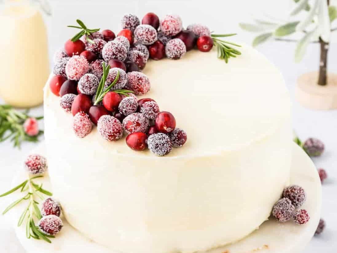 Eggnog Cake on a cake stand. 