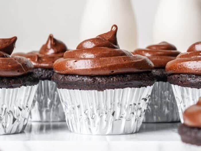 Gluten Free Dairy Free Cupcakes with chocolate frosting.
