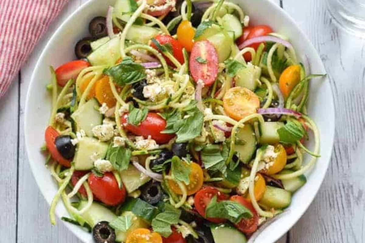 Zucchini noodle salad in a bowl.