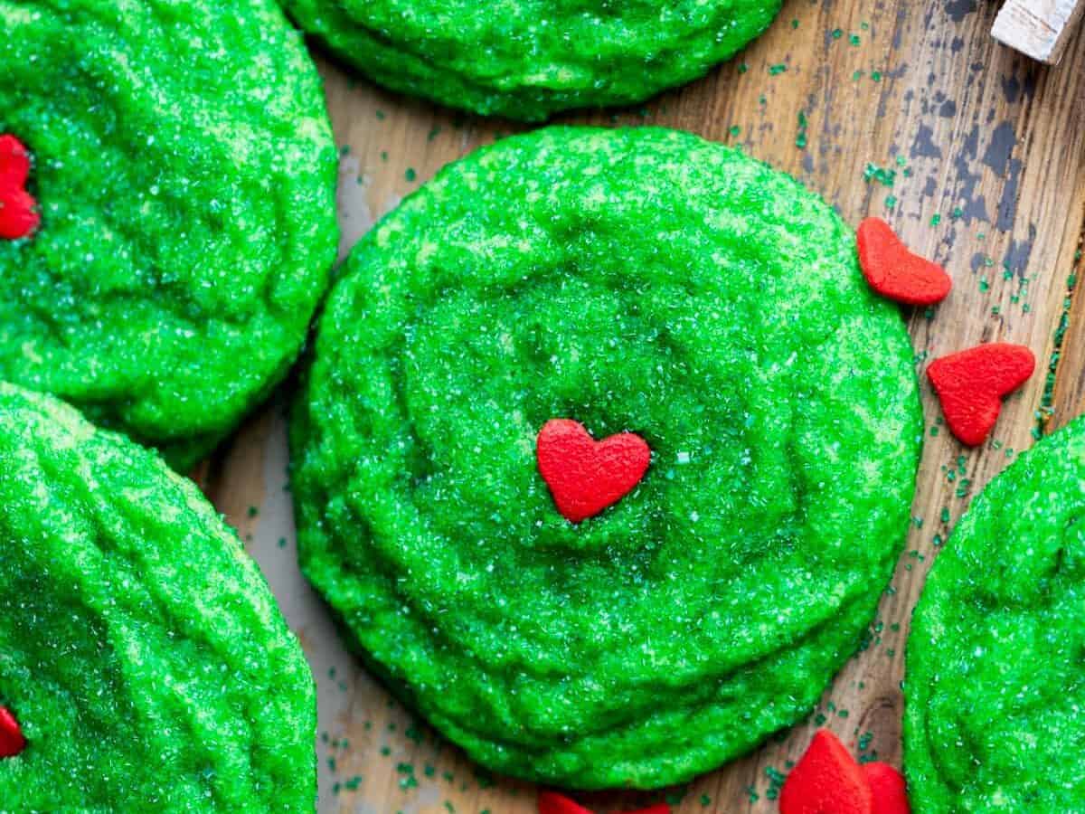 Grinch cookies with heart sprinkles. 
