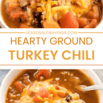 Two bowls of healthy turkey chili topped with shredded cheddar cheese, one shown being lifted by a spoon.