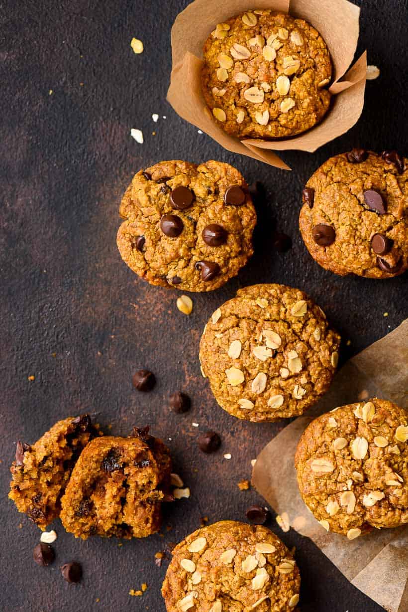 Healthy Pumpkin Muffins topped with chocolate chips and oats.