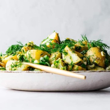 herbed potato salad on a plate.