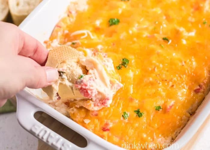 Crab dip with melted cheese on top.