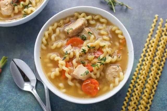 Instant pot chicken soup in a bowl.