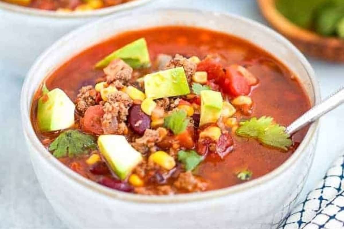 Instant pot taco soup with avocado topping.