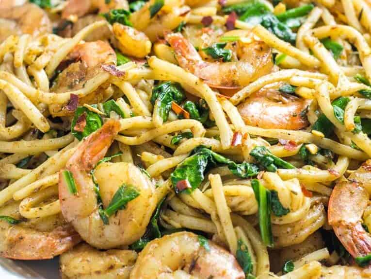 Pasta with spinach and shrimp.