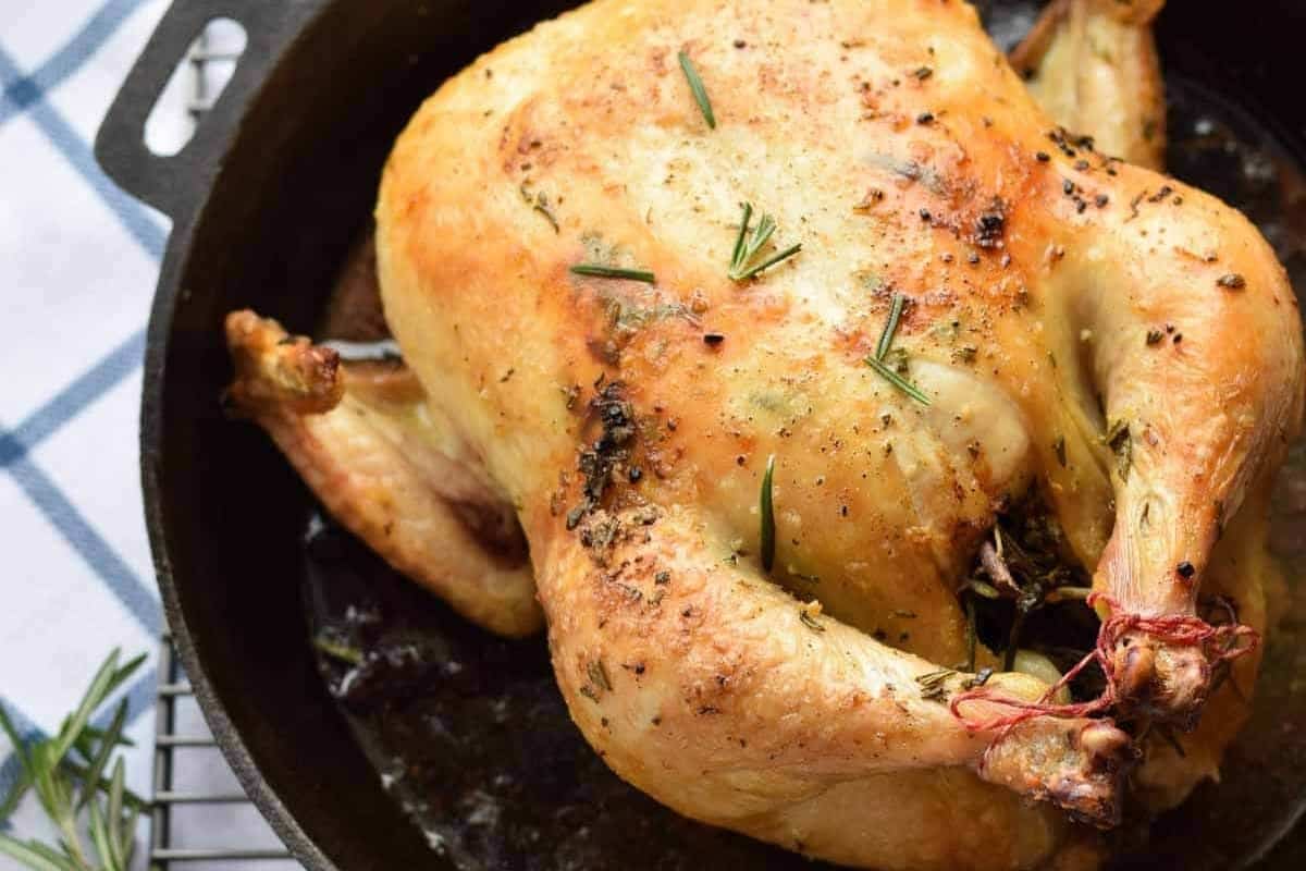 Roasted chicken in a pan.
