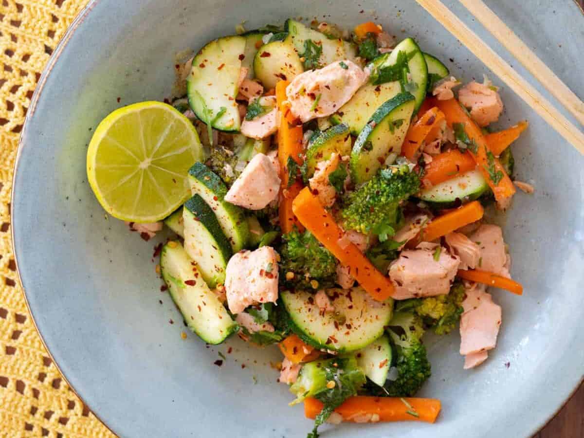 Stir fried salmon with broccoli and carrots.