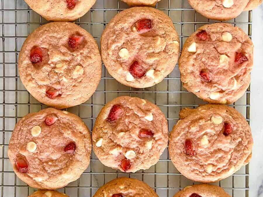 Strawberry Cheesecake Cookies on a cooling rack.