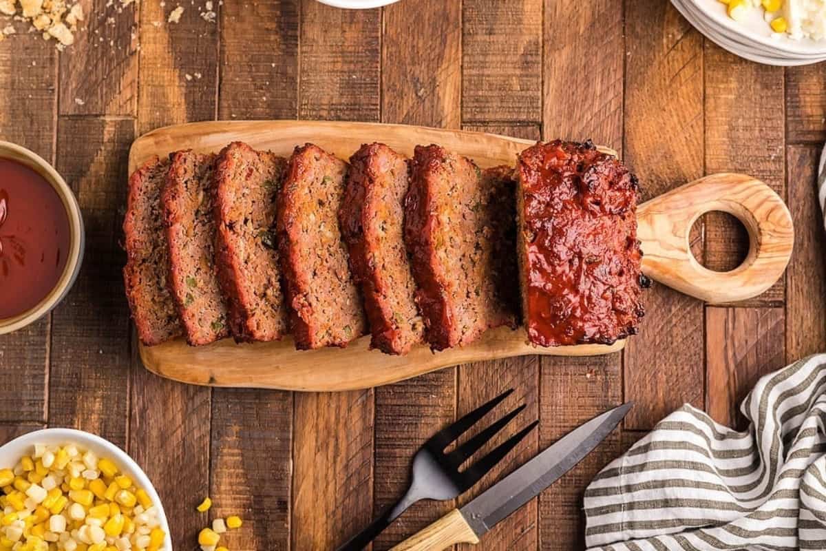 Smoked meatloaf on a wooden board.