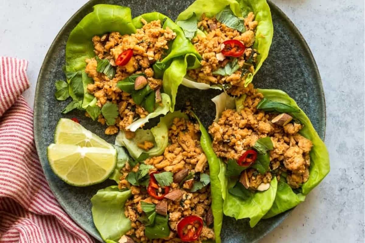 Lettuce Wraps on a plate with lemon.