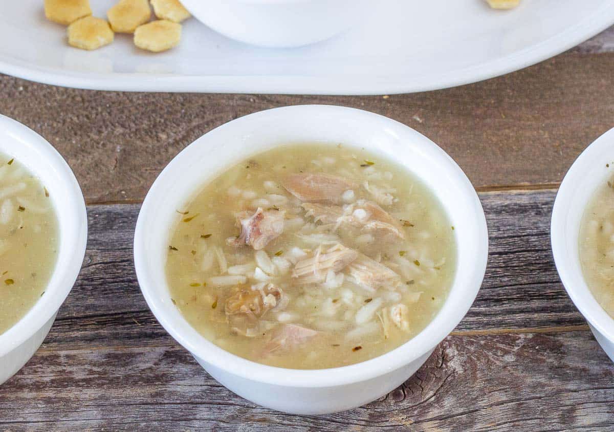 Turkey rice soup in a small bowl. 