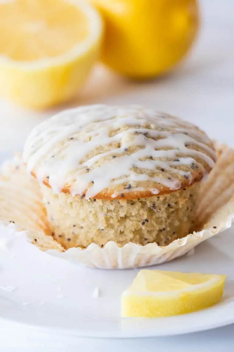 Gluten Free Lemon Poppy Seeds Muffins with sugar drizzle on top. 