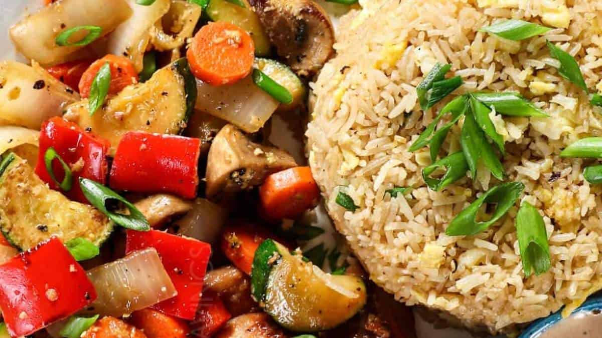 A plate with rice and vegetables on it.