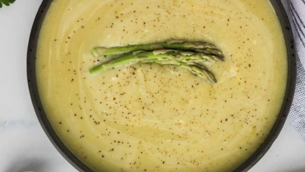 A delicious soup recipe featuring asparagus and parmesan cheese.