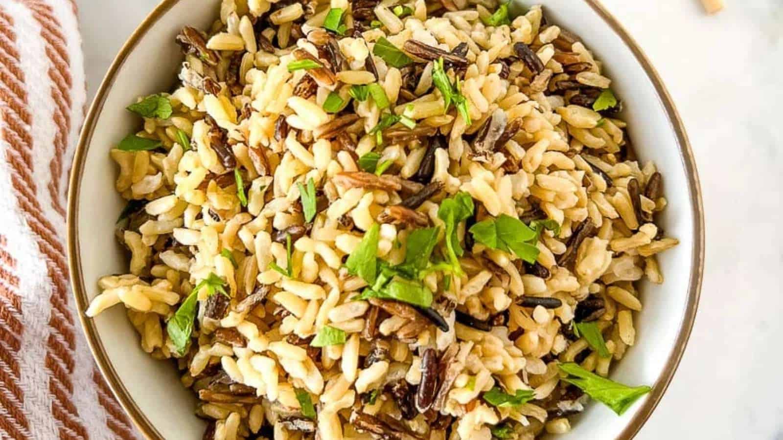 Wild rice salad in a white bowl.