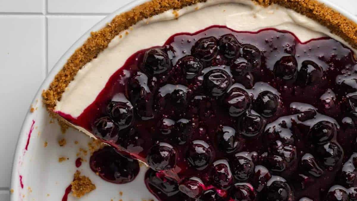 A round up of shared no bake blueberry pies on white plates.