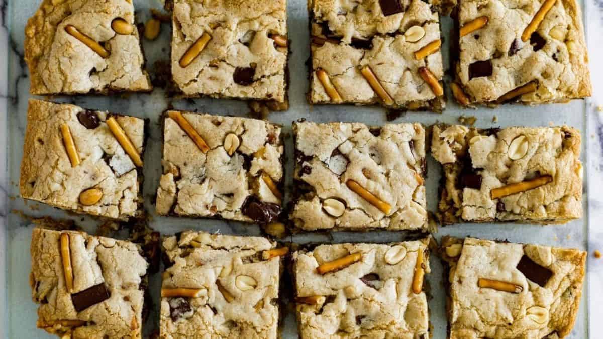 Chocolate pretzel bars on a baking sheet.