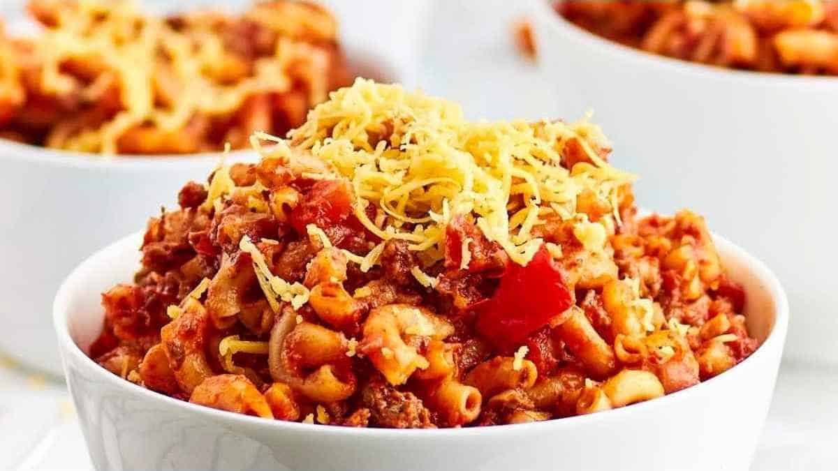 A bowl of chili in a white bowl.