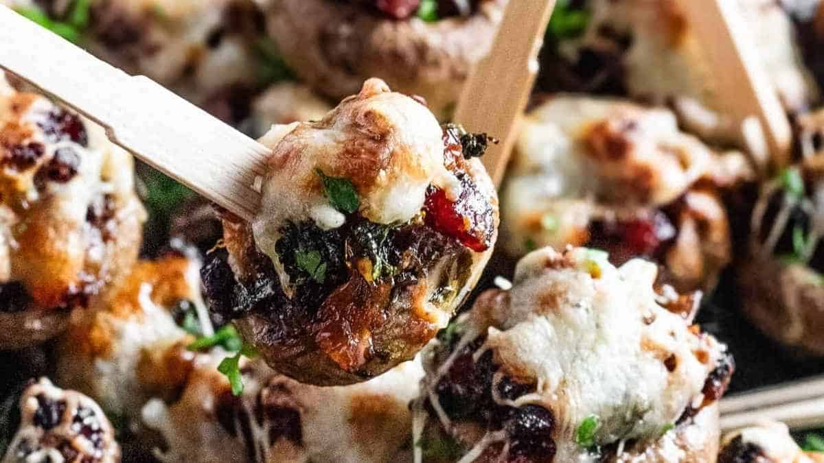 Stuffed mushrooms with cheese and cranberries.