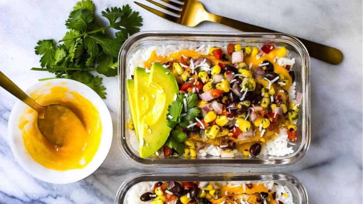 Mexican rice bowls with avocado and guacamole.