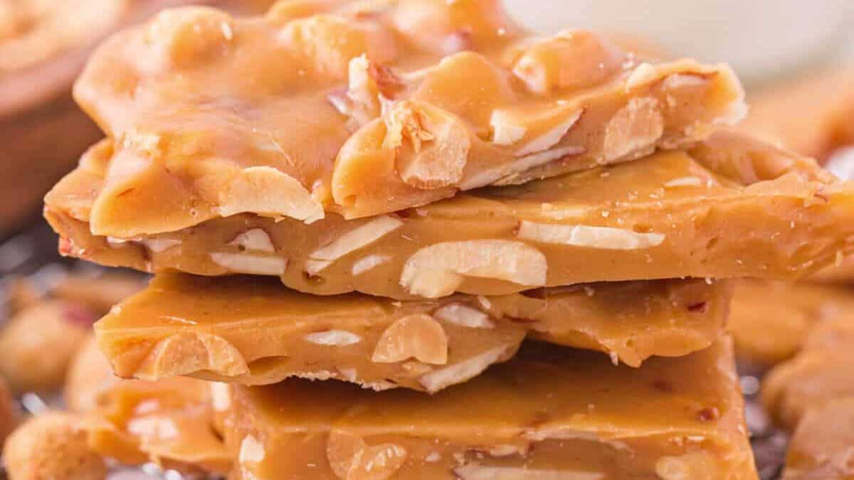 A stack of peanut brittle on a cooling rack.