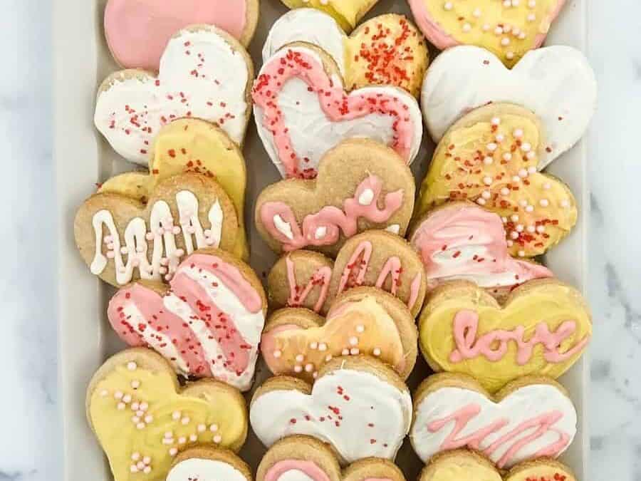 Valentine's day cookies on a white plate.