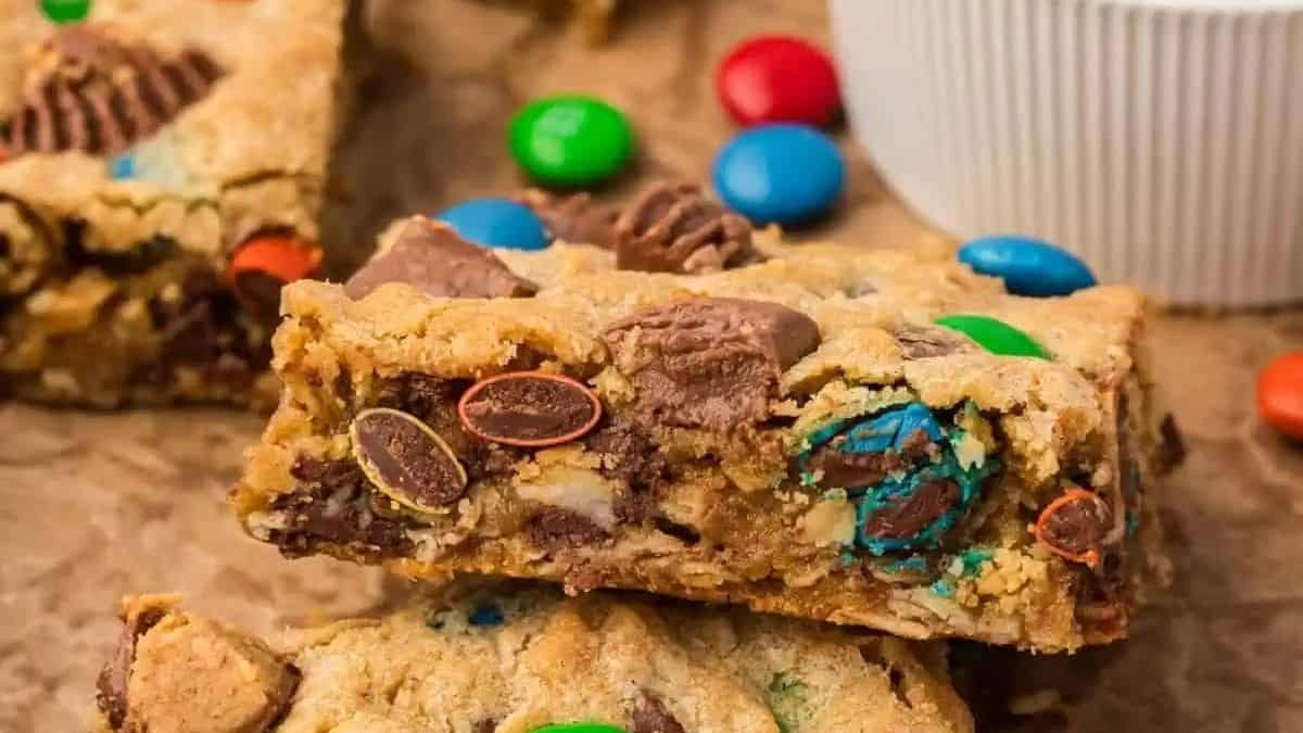 M&m cookie bars stacked on top of each other.