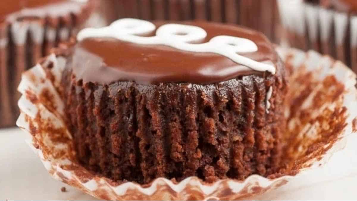 Chocolate cupcakes with icing on top.