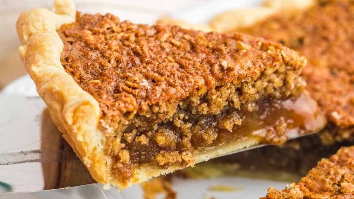 A slice of pecan pie on a plate.