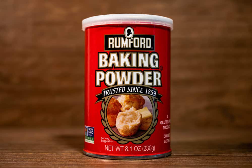 Humford baking powder on a wooden table.