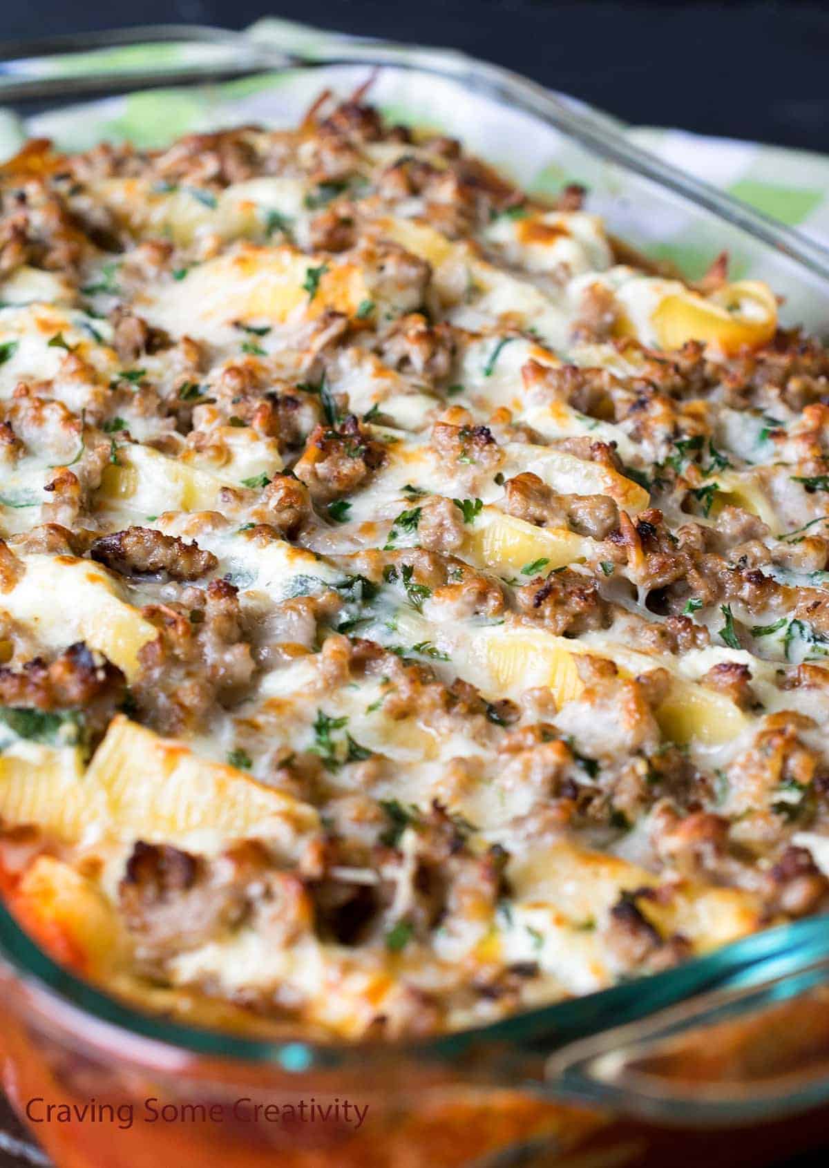 A delicious casserole dish bursting with savory sausage and melted cheese.