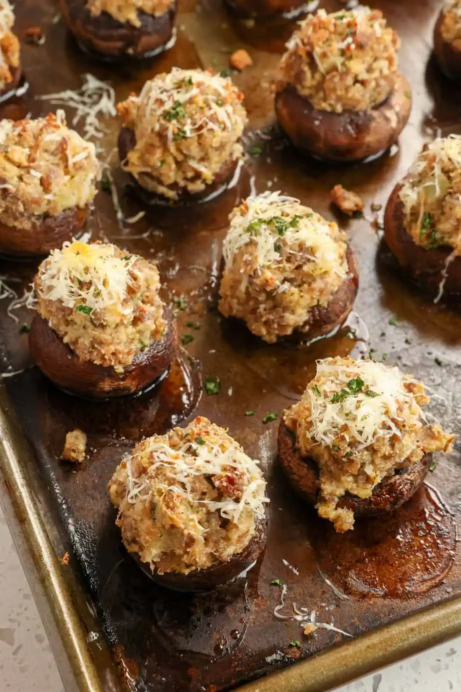 A flavorful tray of ground sausage-stuffed mushrooms.